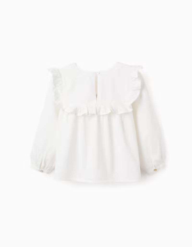 Blusa de algodón con volantes y bordados blanca