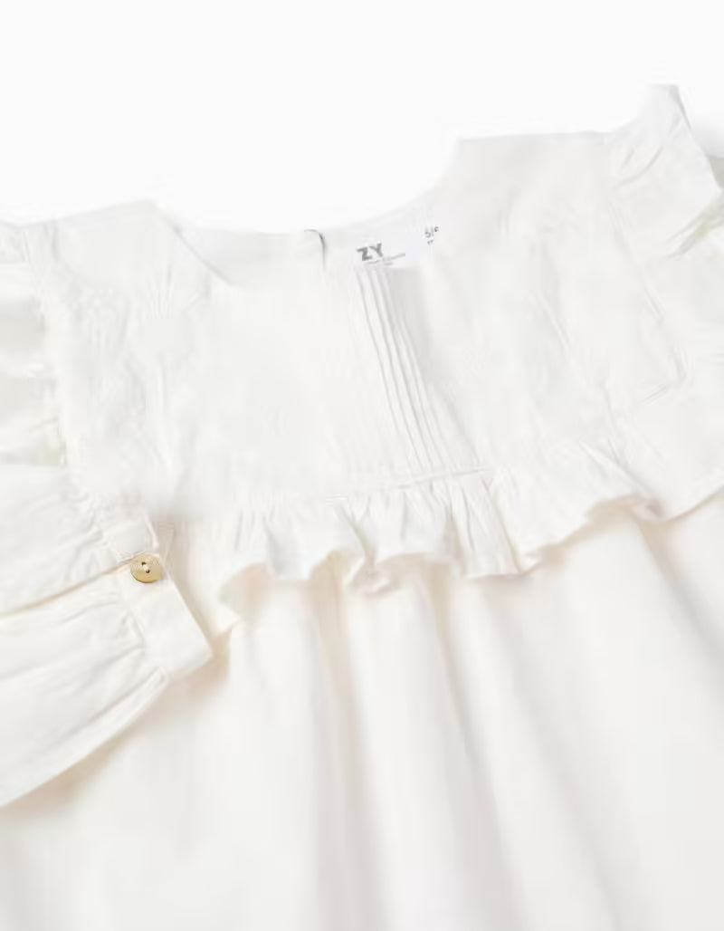 Blusa de algodón con volantes y bordados blanca