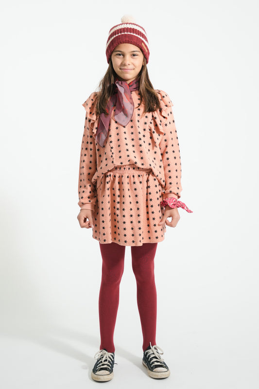 Falda corta | Rosa con estrellas negras