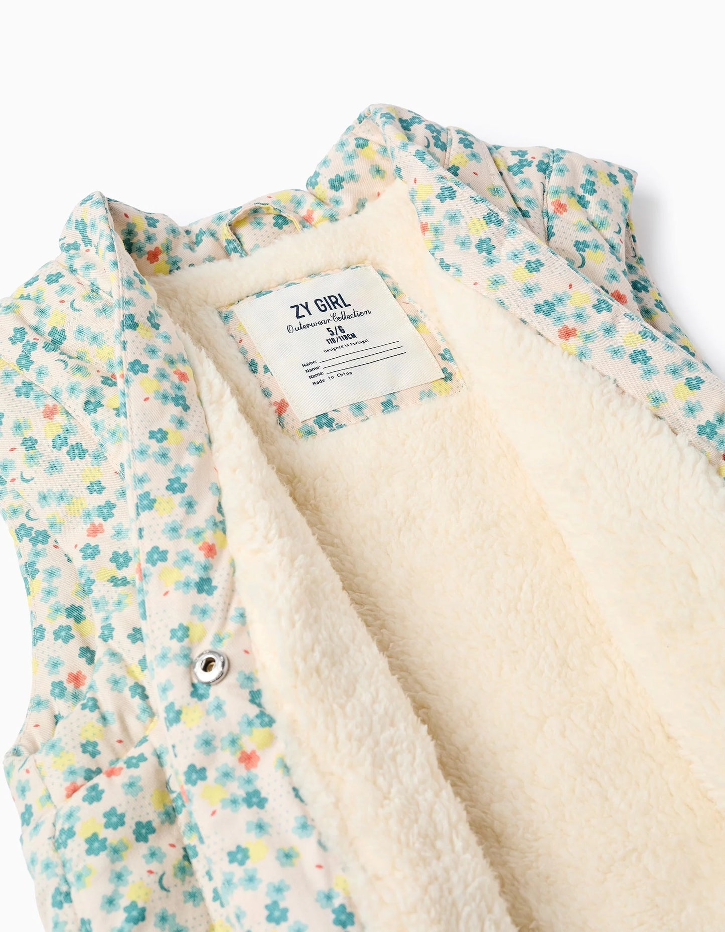 Chaleco de algodón con motivo floral y forro en sherpa para niña beige