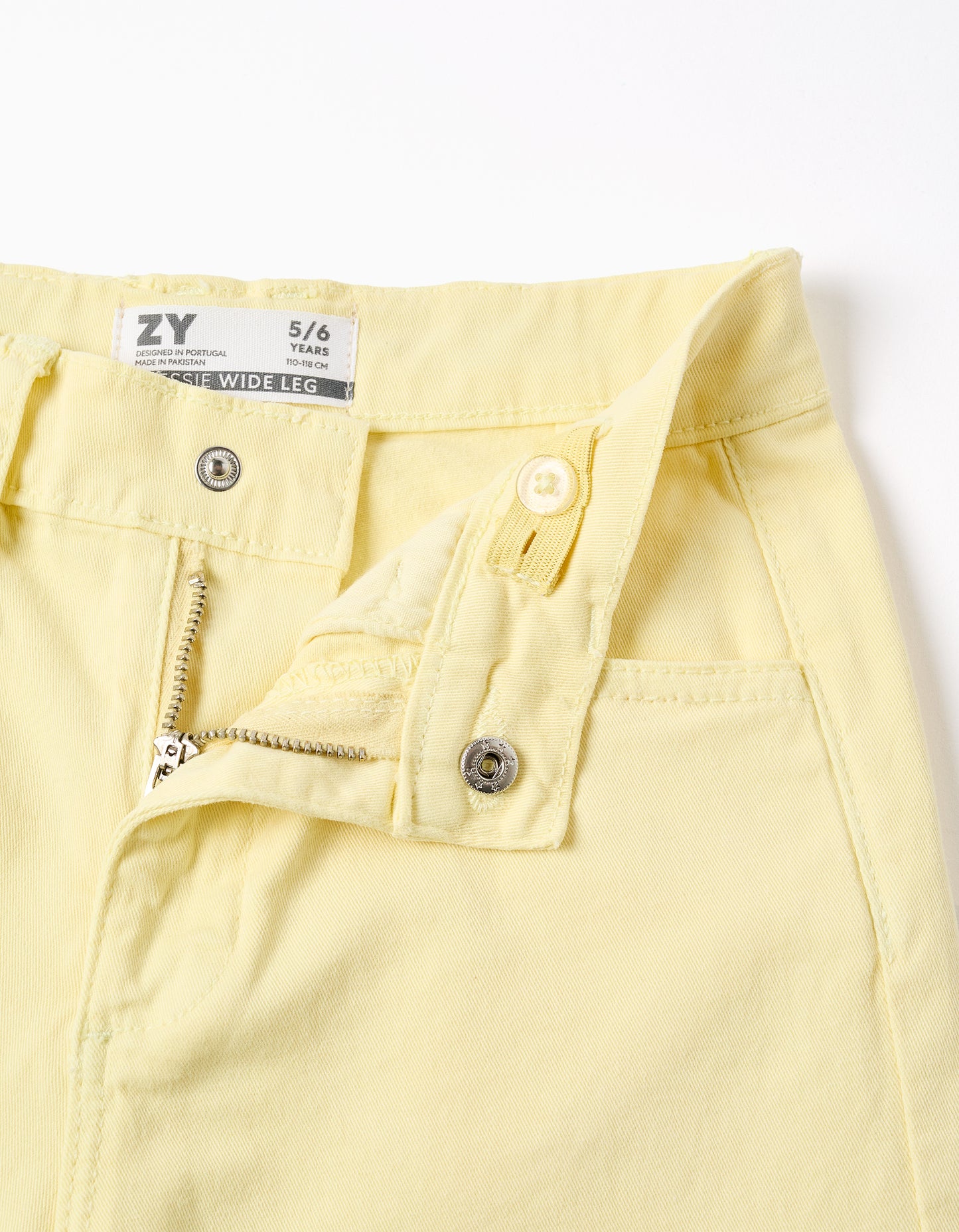 Pantalón niña de sarga de pierna ancha amarillo claro
