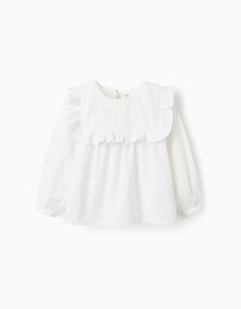 Blusa de algodón con volantes y bordados blanca