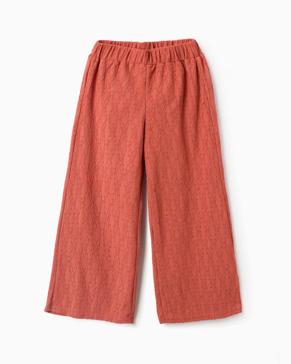 Pantalón niña de pierna ancha y con bordado inglés